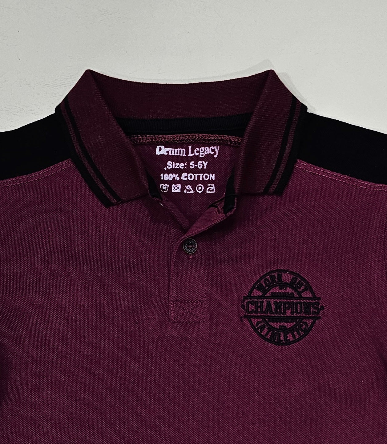 Boys Maroon PQ fabric polo with Black panel contrast.