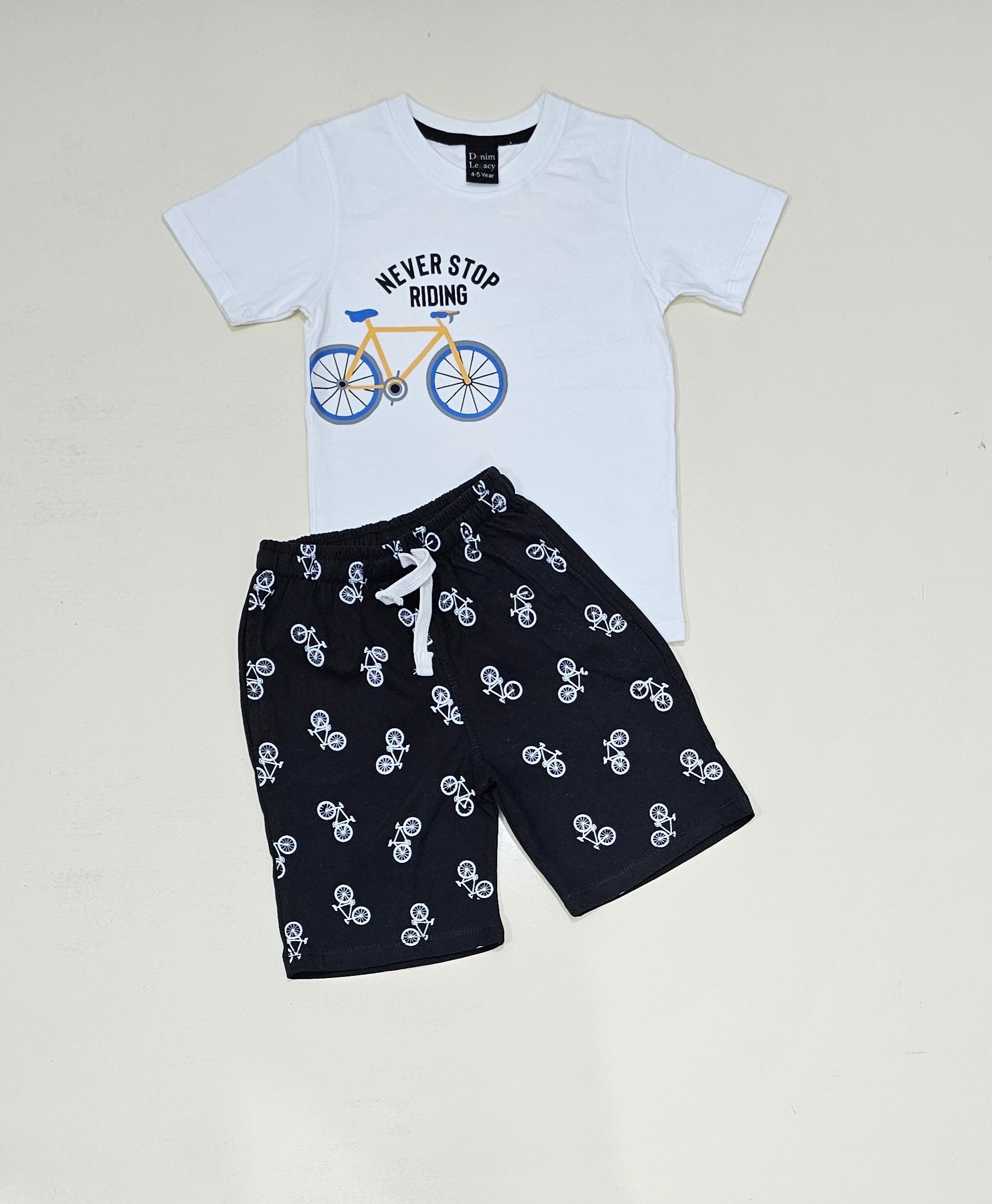 White Tshirt with black shorts, Never stop riding Boys Suit with Shorts in Cotton jersey fabric.